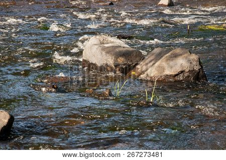 Waterfalls In Summer. Clear And Fresh Water Are Falling Down. Tints Of Green, Blue And White. There 