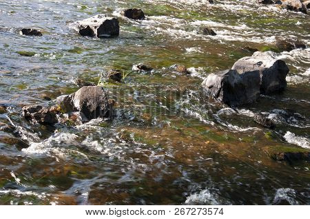 Waterfalls In Summer. Clear And Fresh Water Are Falling Down. Tints Of Green, Blue And White. There 