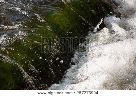 Waterfalls In Summer. Clear And Fresh Water Are Falling Down. Tints Of Green, Blue And White. There 