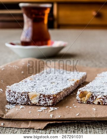 Turkish Dessert Cezerye With Walnut, Coconut Powder And Tea