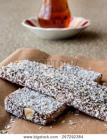 Turkish Dessert Cezerye With Walnut, Coconut Powder And Tea