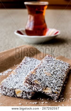 Turkish Dessert Cezerye With Walnut, Coconut Powder And Tea