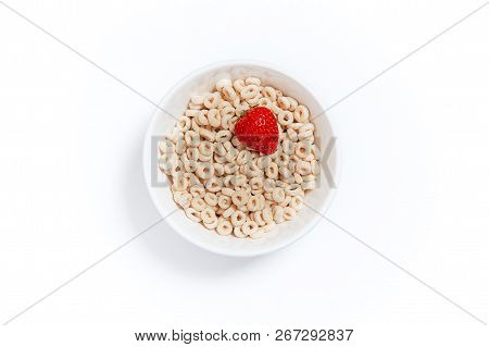 Oat Rings Cereal With Strawberry. Bowl Of Cereal With Berries On A White Background. Flat Lay, Top V