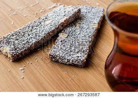 Turkish Dessert Cezerye With Walnut, Coconut Powder And Tea
