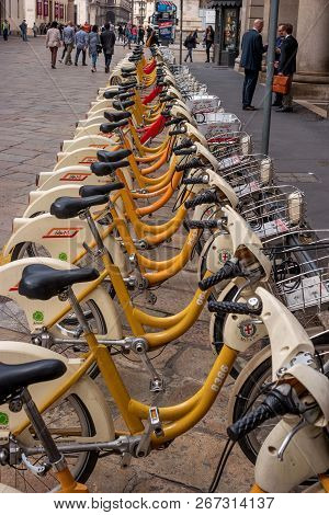 Milan, Italy - 09 May 2018: Yellow Bikemi Bicycles For Rent In A Parking Spot