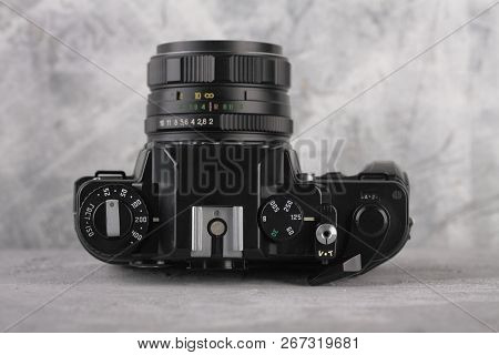 Moscow, Russia, May 14, 2017. The Old Soviet 35 Mm Slr Camera Zenit 122, Released 1997, On Cement Ba