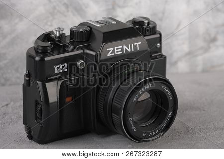 Moscow, Russia, May 14, 2017. The Old Soviet 35 Mm Slr Camera Zenit 122, Released 1997, On Cement Ba