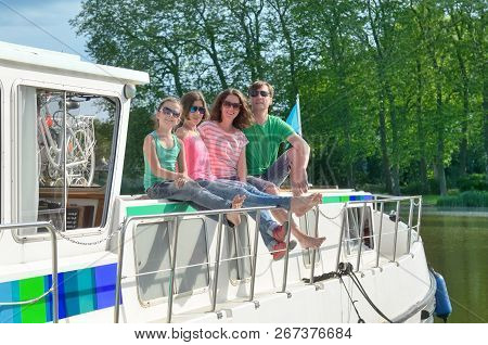 Family Vacation, Summer Holiday Travel On Barge Boat In Canal, Happy Kids And Parents Having Fun On 