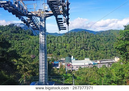 Genting Highlands, Malaysia - December 21 : Tourists Travel On Cable Car Of Genting Skyway. It Is A 