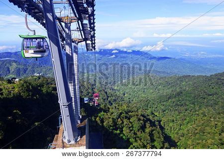 Genting Highlands, Malaysia - December 21 : Tourists Travel On Cable Car Of Genting Skyway. It Is A 
