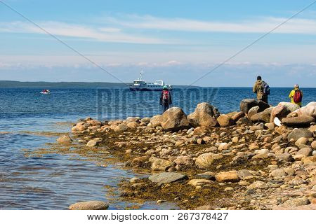 Island Anzersky, Russia - June 26, 2018: Tourists Land On The Island Of Anzersky From The Ship On An