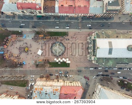 Overtop View Of Square Before Old European Building.