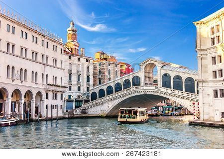 Vaporetto Under The Rialto Bridge Near The Fondaco Dei Tedeschi, Palazzo Dei Camerlenghi And The Dom