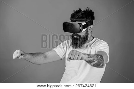 Virtual Driving Lessons Concept. Hipster On Confident Face Driving Bike In Virtual Reality With Mode