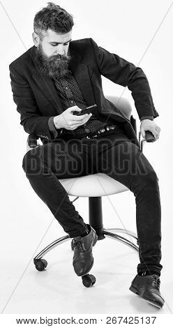 Serious Men Or Businessmen Using Mobile Or Cell Phone