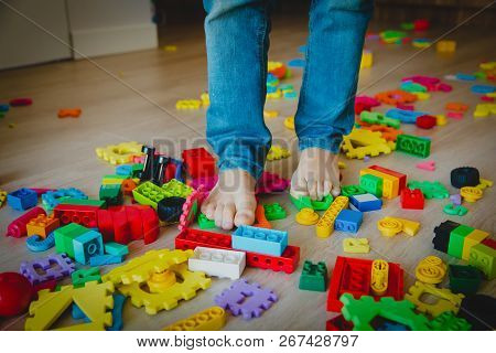 Too Much Toys At Home- Little Boy Steps On Toys Trying To Go Through