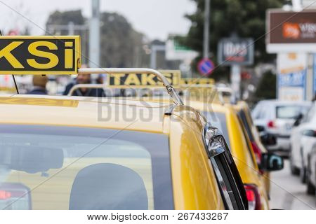 Series Of Taxi Cars Aligned On The Street In Izmir (turkey)