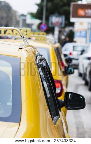 Series Of Taxi Cars Aligned On The Street In Izmir (turkey)