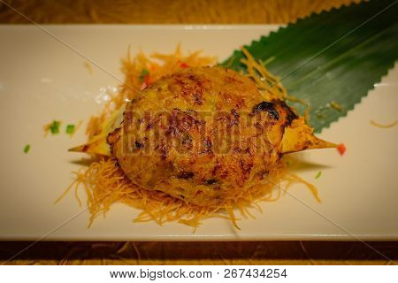 Baked Crab Shell Stuffed With Crab Meat And Black Truffle Paste