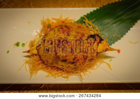 Baked Crab Shell Stuffed With Crab Meat And Black Truffle Paste