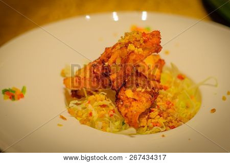 Fried Little Yellow Croaker Fish With Salt And Chili Pepper