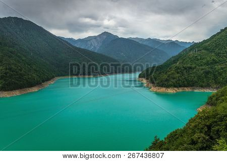 Inguri Water Reservoir With Vibrant Blue Water