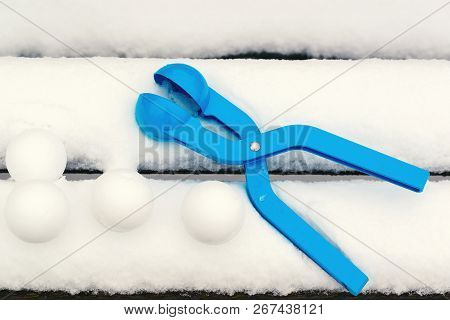 Snowballs With Snowball Maker. Kid Winter Games With Snow. Snowballs Game. Outdoors.