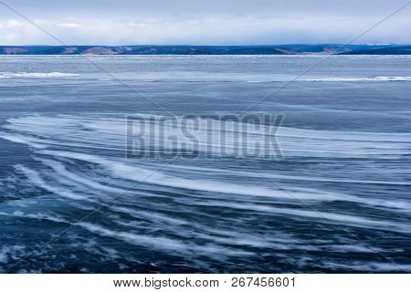 Lake Khubsugul Is Covered With Ice And Snow, Strong Cold, Thick Clear Blue Ice. Lake Khubsugul Is A 