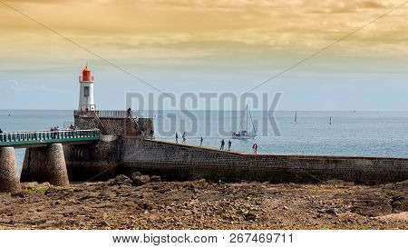 View Of The Jetty And The Lighthouse Of Les Sables D'olonne, France