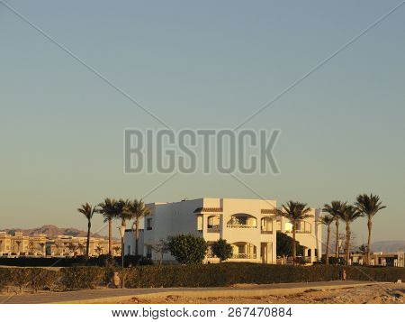 Egypt: Lonely Standing Building In The Desert Among The Sands In The Rays Of The Rising Sun In The E