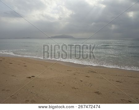 Seascape - Desert Beach With Yellow Sand And Endless Sea In Cloudy Weather