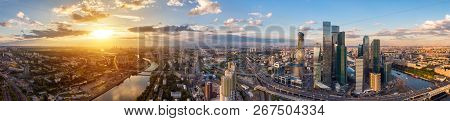 Panorama High-rise Buildings And Transport Of Metropolis, Traffic And Blurry Lights Of Cars On Multi