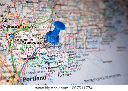 A Map Of Brunswick, Maine Marked With A Push Pin.