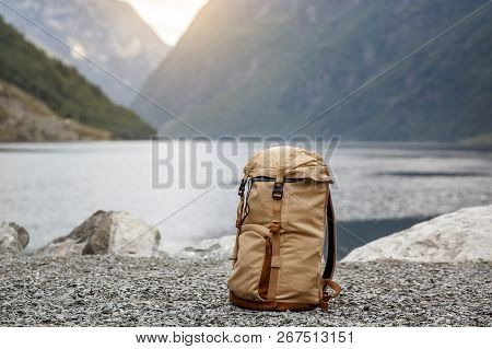 Tourists Backpack . Norvegian Fjords On The Background