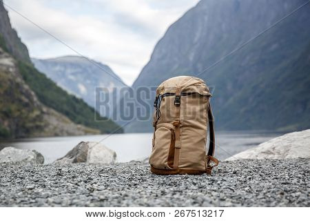 Tourists Backpack . Norvegian Fjords On The Background