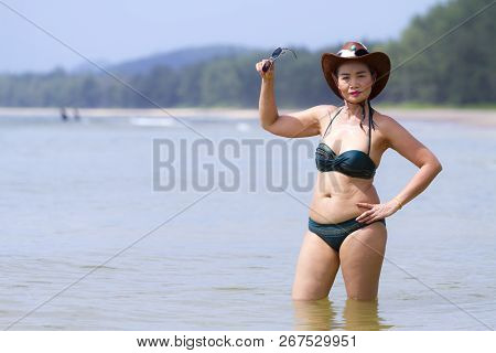 Woman Shape Beautiful With Bikini And Water On Beach At Bang Beot Beach, Chumphon Province Thailand