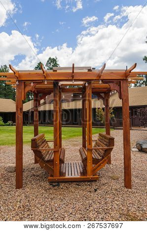 Pinetop-lakeside, Az/july 18, 2018: Wooden Swing Set Is Made For Swinging While Sitting On The Bench