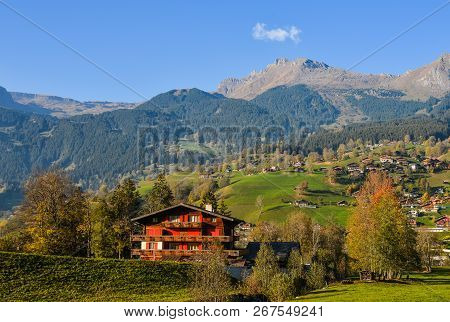 Landscape With Mountain Village In Autumn