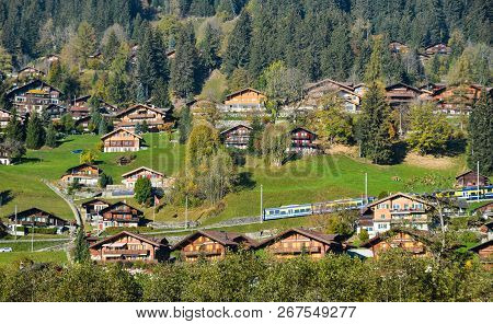 Landscape With Mountain Village In Autumn
