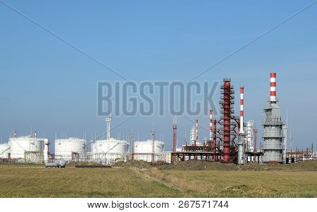 Distillation Columns, Pipes And Other Equipment Furnaces Refinery. The Oil Refinery. Equipment For P