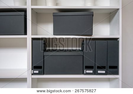 Empty Paper Filing Box And File Holder On Office Shelf.