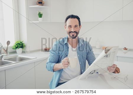 Attractive Good-wearing Brunet Hair Man Sit In Casual Checkered Shirt Indoor Modern Interior Flat Ho