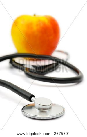 Medicinsk stetoskop og æble
