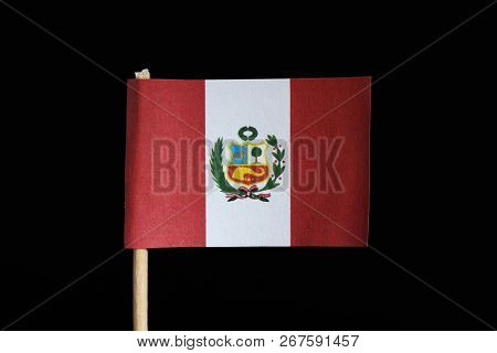 A Official And Original Flag Of Peru On Toothpick On Black Background. A Vertical Triband Of Red And