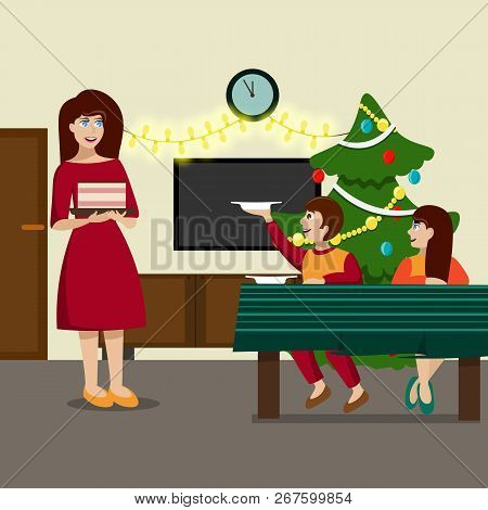 Beautiful Young Mother With A Cake In Her Hands. Small Children For Stolon On Christmas Eve In Antic