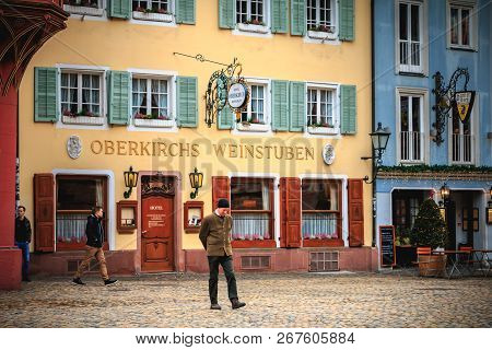 Freiburg Im Breisgau, Germany - December 31, 2017: People Walking In Front Of The Hotel Restaurant O