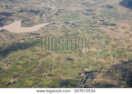 High aerial view of patchwork of farms in rural Ethiopia.