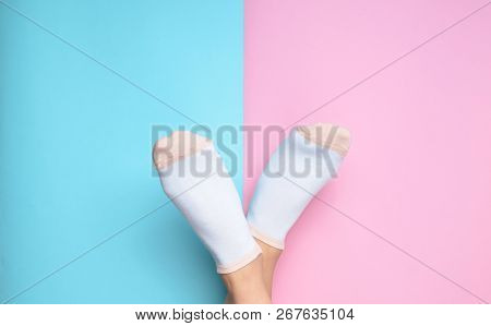 woman feet whith socks top view, minimalism
