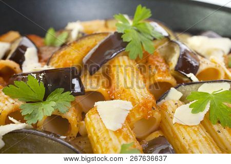 The Most Famous Dish Of Sicily, This Tastes Divine. Its Pasta In Tomato Sauce, With Fried Aubergine 