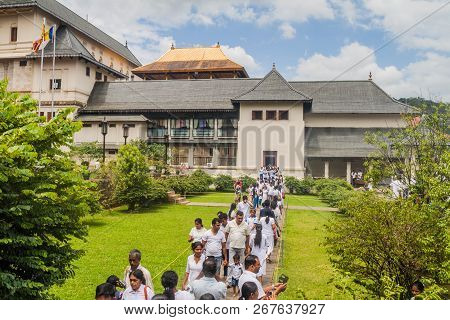 Kandy, Sri Lanka - July 19, 2016: White Clothed Buddhist Devotees In The Temple Of Sacred Tooth Reli